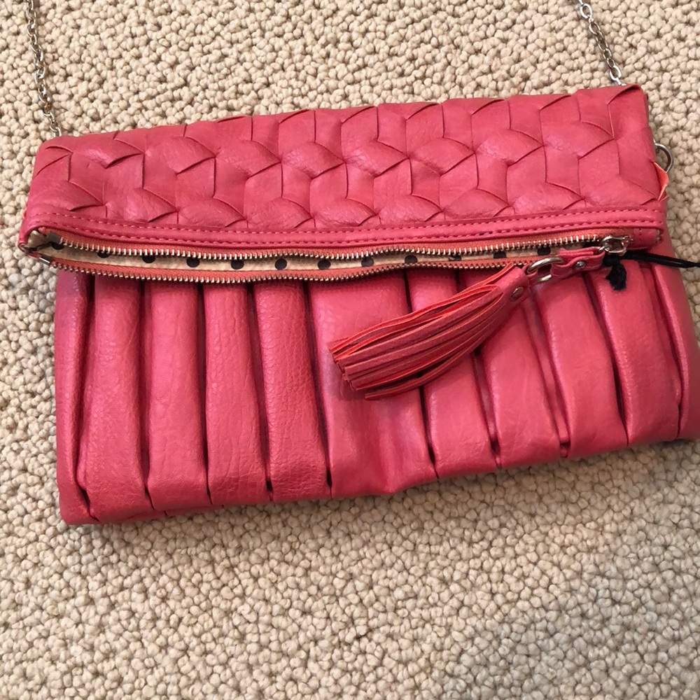 Urban expressions coral clutch with link straps